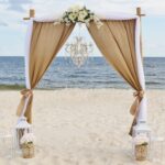Burlap and white Wedding Ceremony Arch by Beach Weddings Alabama