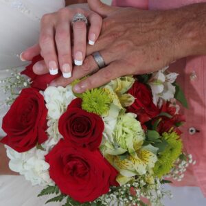 Red brides bouquet by Beach Weddings Alabama