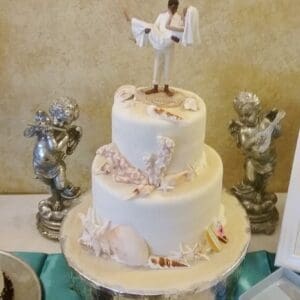 Elegant seashells wedding cake by Beach Weddings Alabama