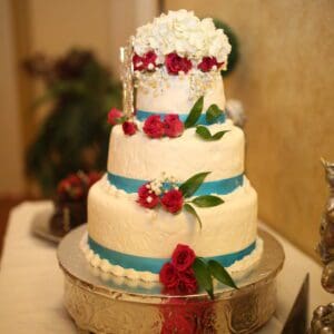 Delicious Turquoise n red wedding cake by Beach Weddings Alabama