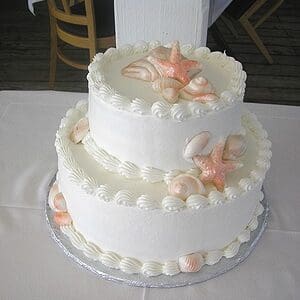 Seashells wedding cake by Beach Weddings Alabama