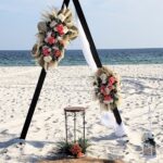Rustic Triangle coral arch by Beach Weddings Alabama