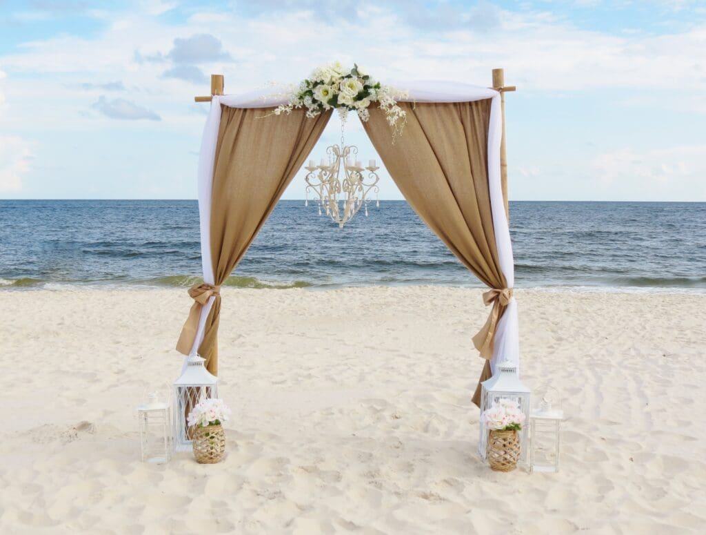 Natural beauty tan wedding arch by Beach Weddings Alabama