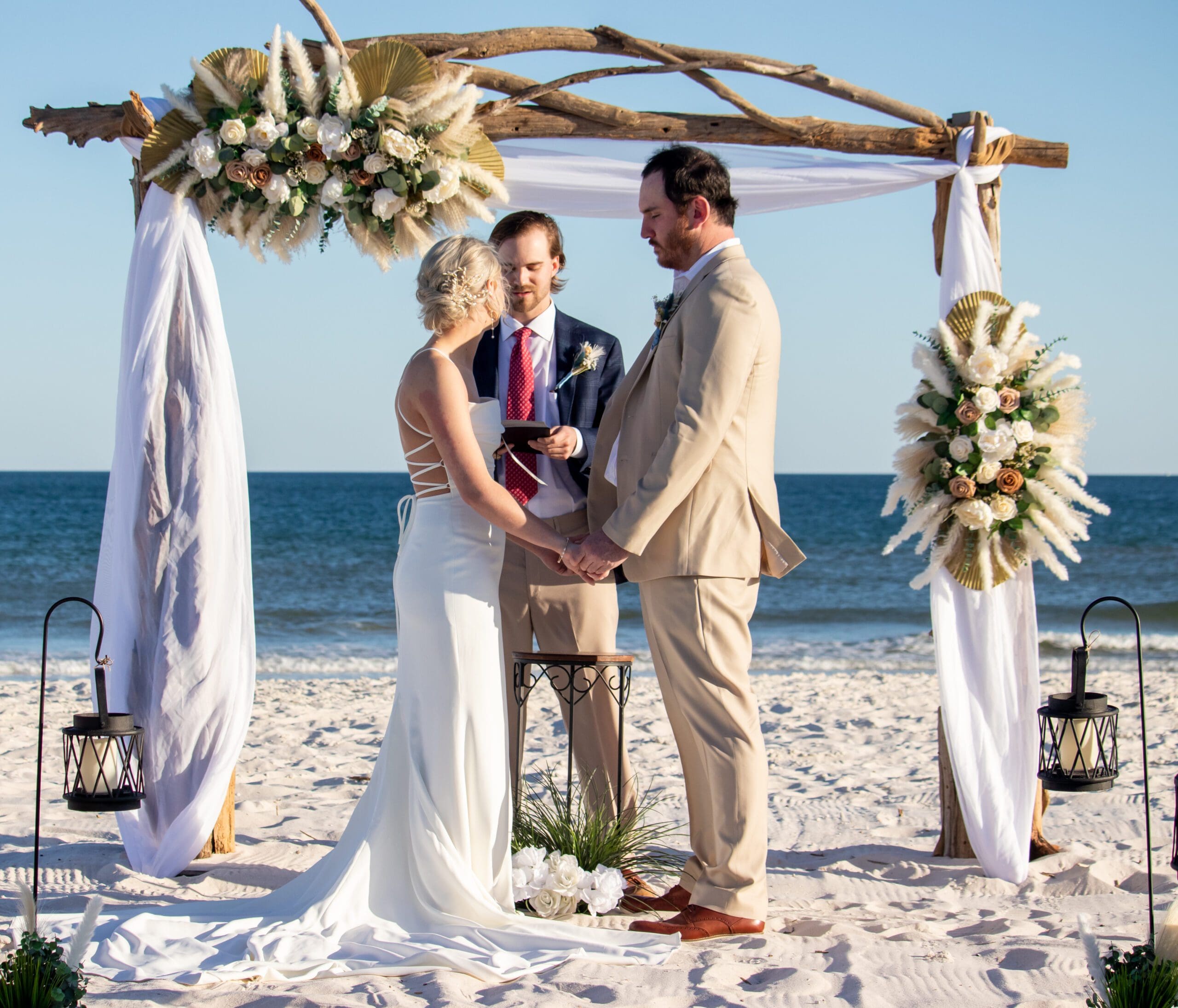 Driftwood Arch Ceremony on the beach by www.BeachWeddingsAlabama.com
